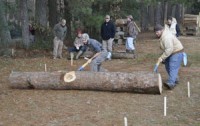 Blaine Culwell (left) and Cody Cormier compete in the log roll.