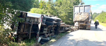 Trash truck trailer rollover